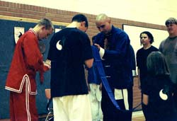 Buddha Zhen receiving Patriarch Sash of Shaolin Chi Mantis and Tai Chi Youth